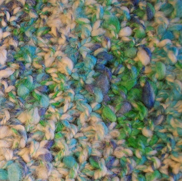 close shot showing the texture and colours of the infinity scarf